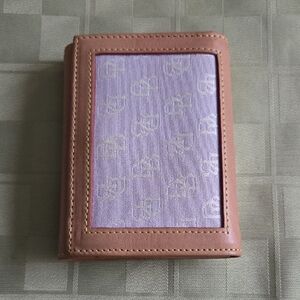 Dooney & Bourke Lavender Tri-Fold Wallet
